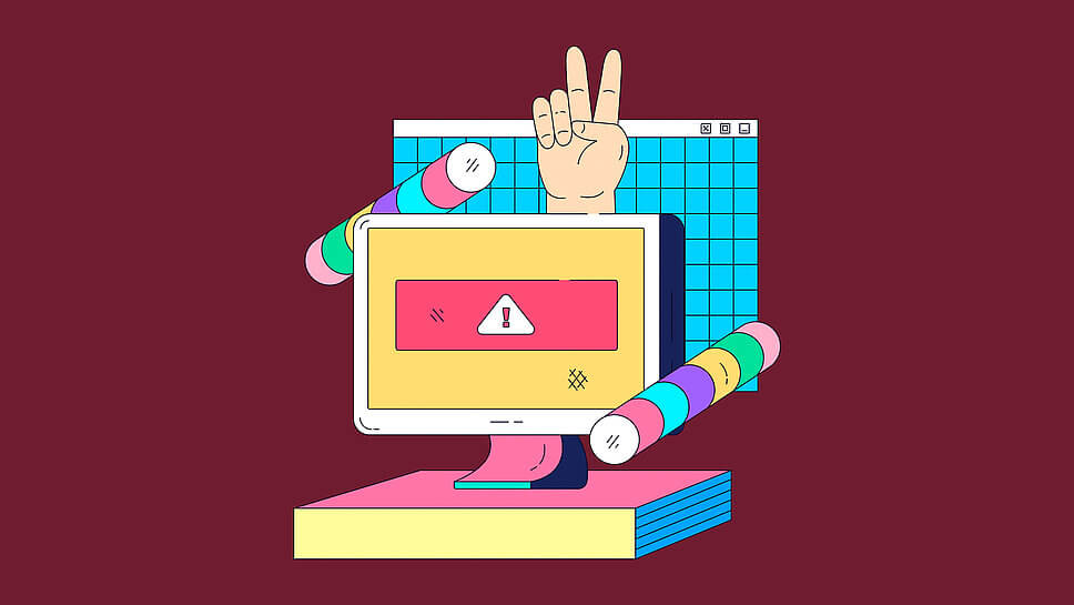 Ein Computerbildschirm zeigt ein Alarmsignal, darüber formt eine Hand das “Peace”-Symbol. 